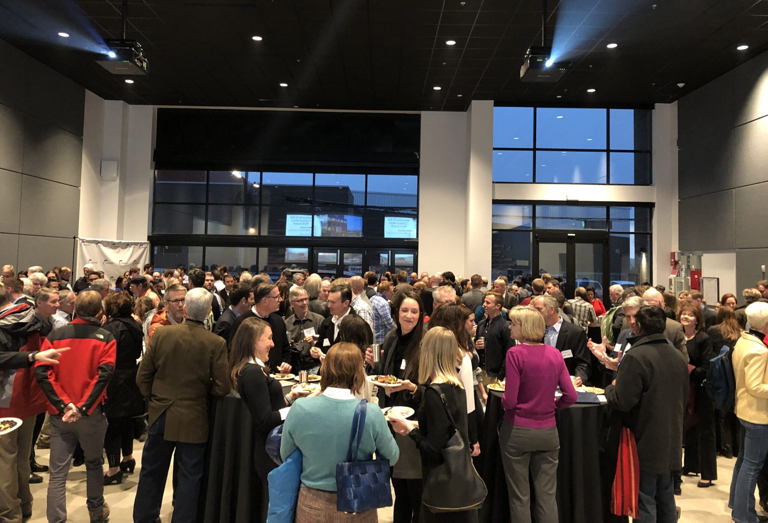 Large group of people in business event space